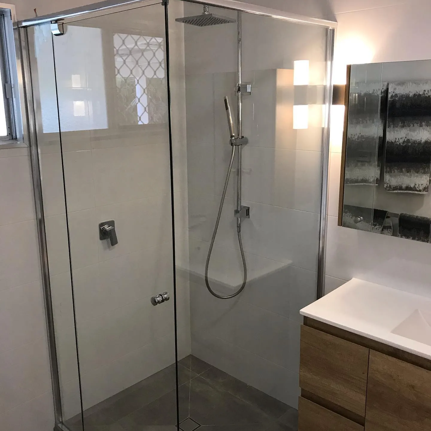 Framed shower screen in a full bathroom fit-out — gallery shower framed full bathroom