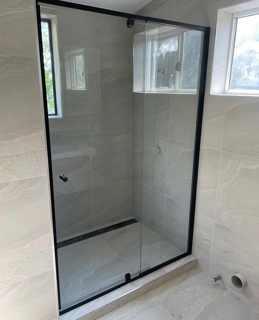 Black framed shower screen with hinged door — gallery shower black frame