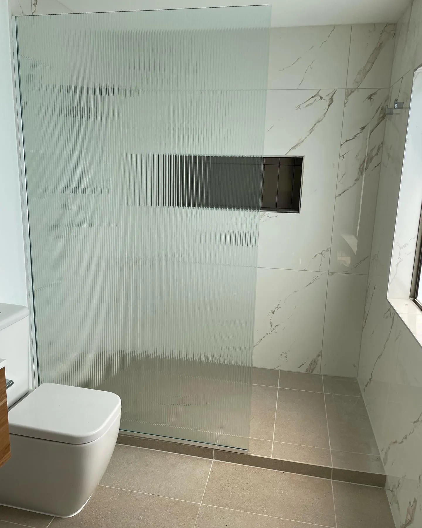 Reeded glass shower screen in a modern bathroom — gallery shower reeded glass